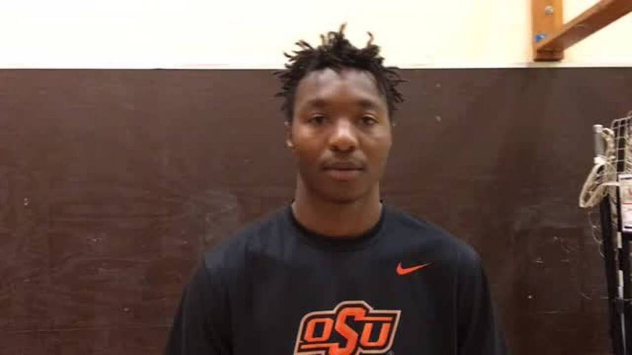 South Miami High center Latravian Glover signs with Oklahoma State University