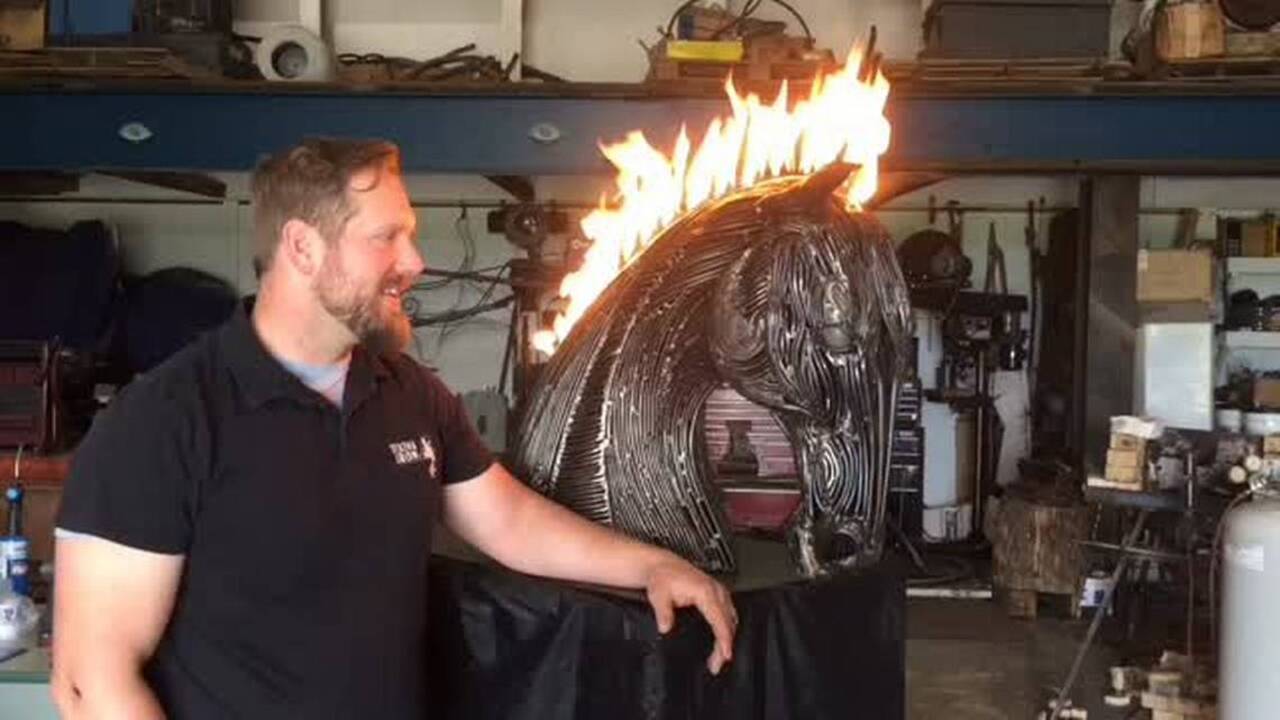 His flaming horse-head sculpture will light up Derby Eve