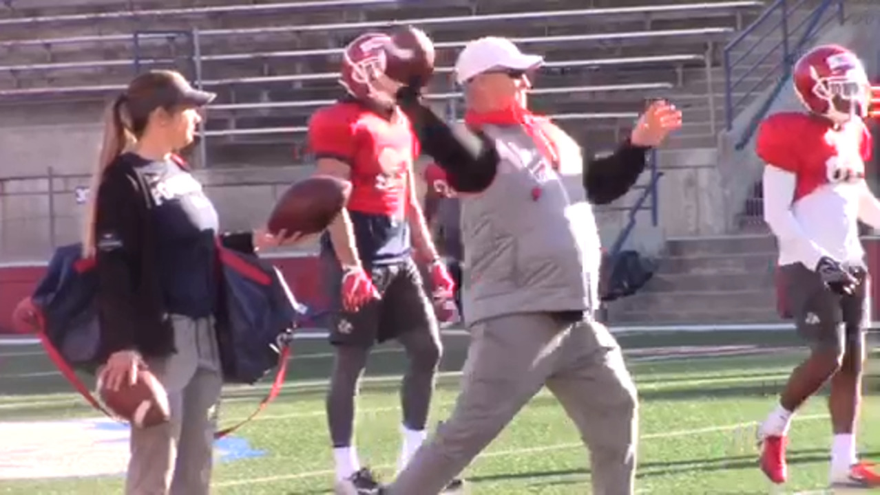 Fresno State football coach Jeff Tedford gets a little busy at spring practice