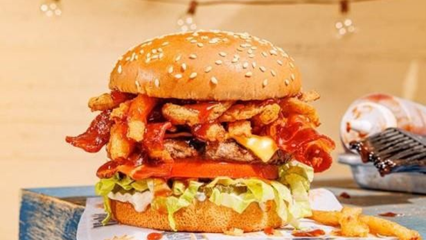 Watch the split-screen assembly of a BBQ Bacon Char at Habit Burger & Grill