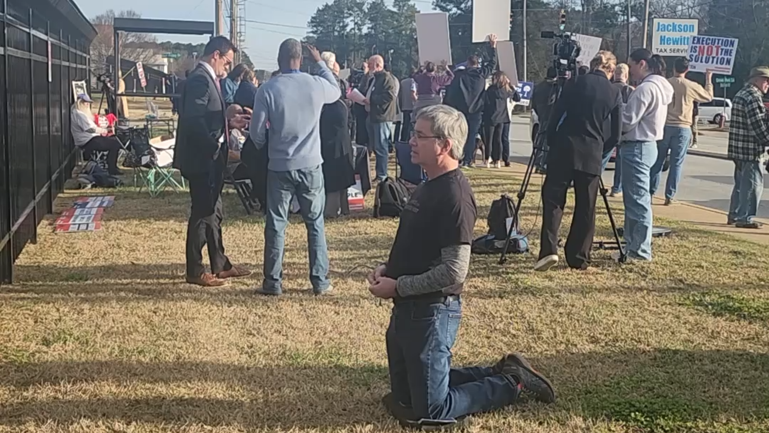 Protestors against Brad Sigmon’s execution gather in the name of God