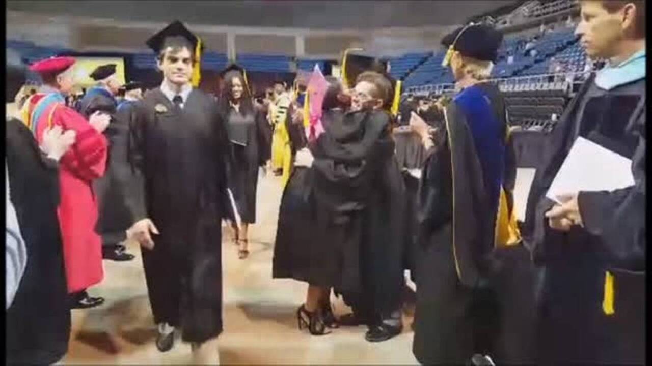 Growing group of grads graces stage at USM's Coast commencement 