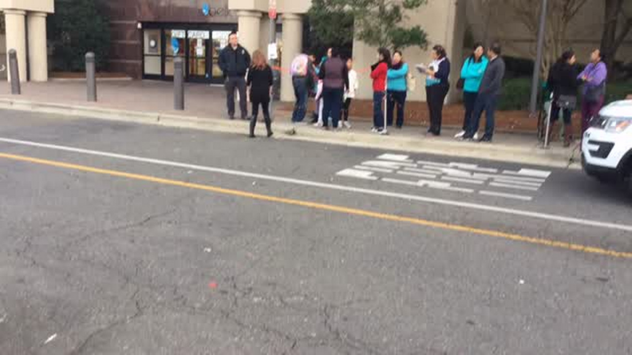Shoppers line up at Belk at Carolina Place Mall