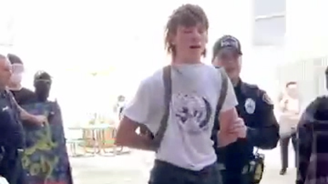 Raw video: Officer tackles, arrests protester at Cal Poly