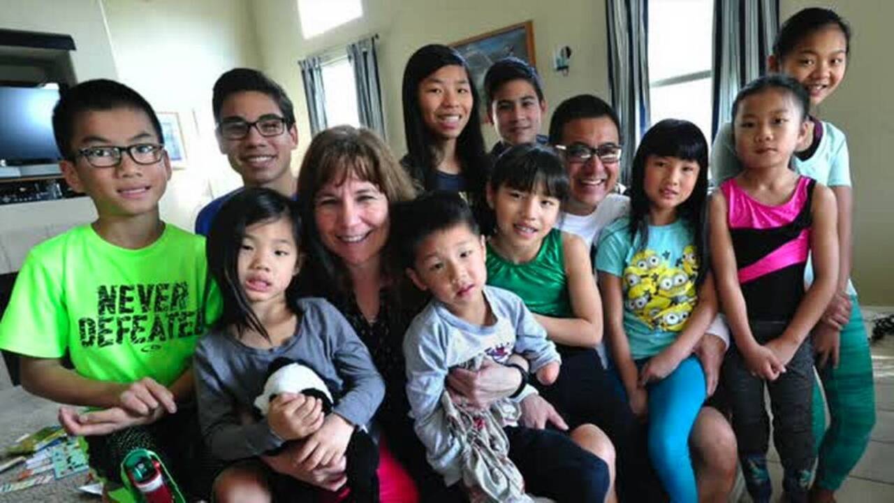 12 children, 7 disabilities and 1 big happy family: Changing the lives of eight Chinese children through adoption