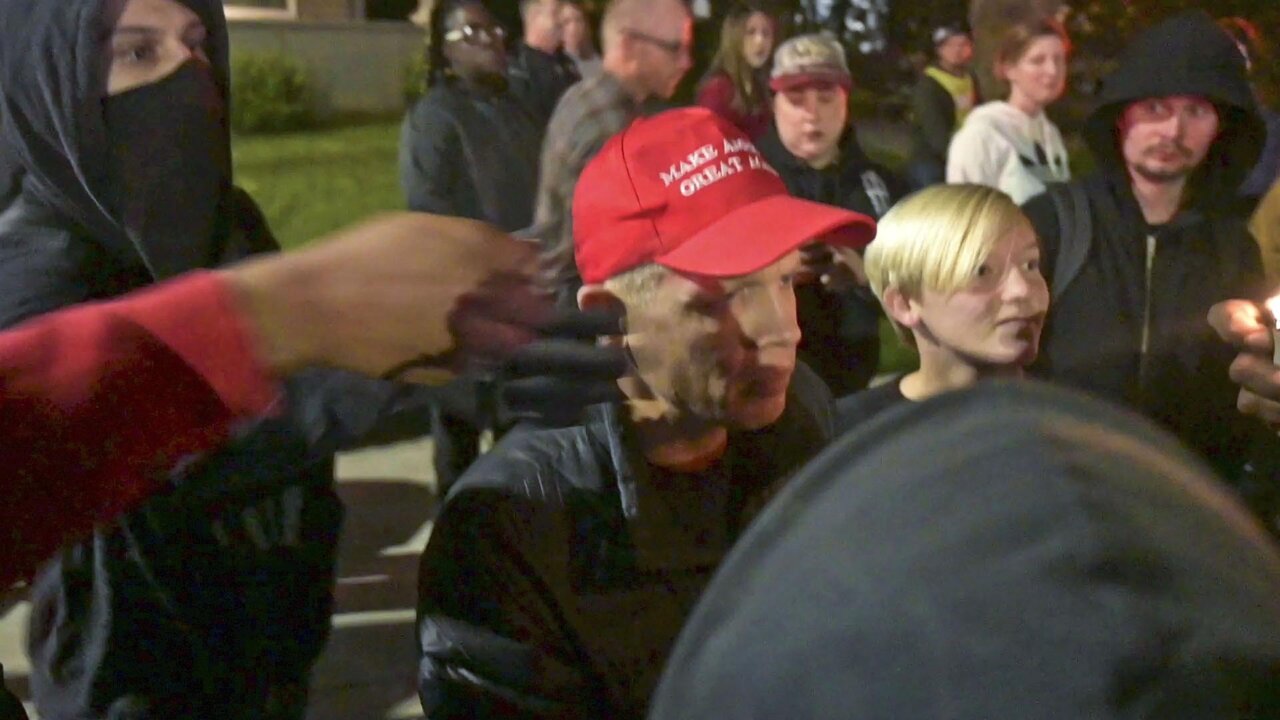 Person with MAGA hat confronts Stephon Clark protesters