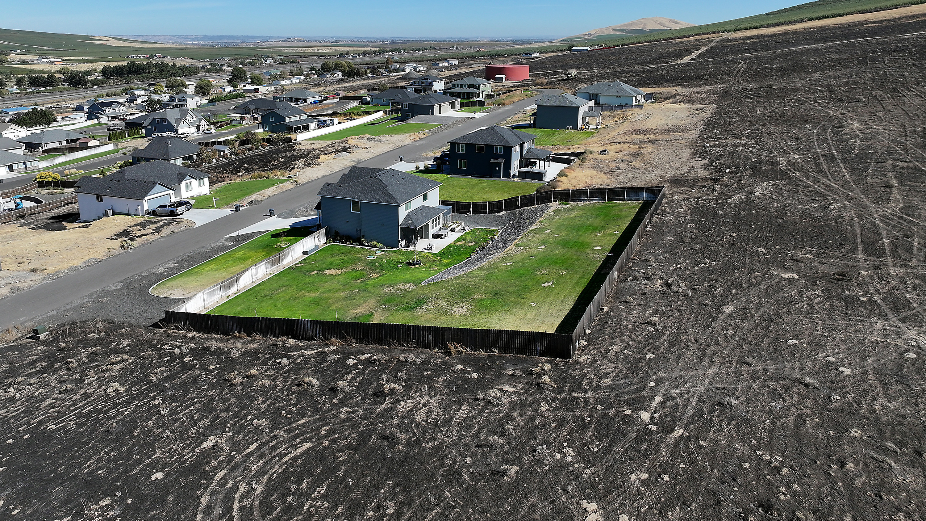 Homes destroyed, 1,150 acres scorched by wildfire west of Tri-Cities