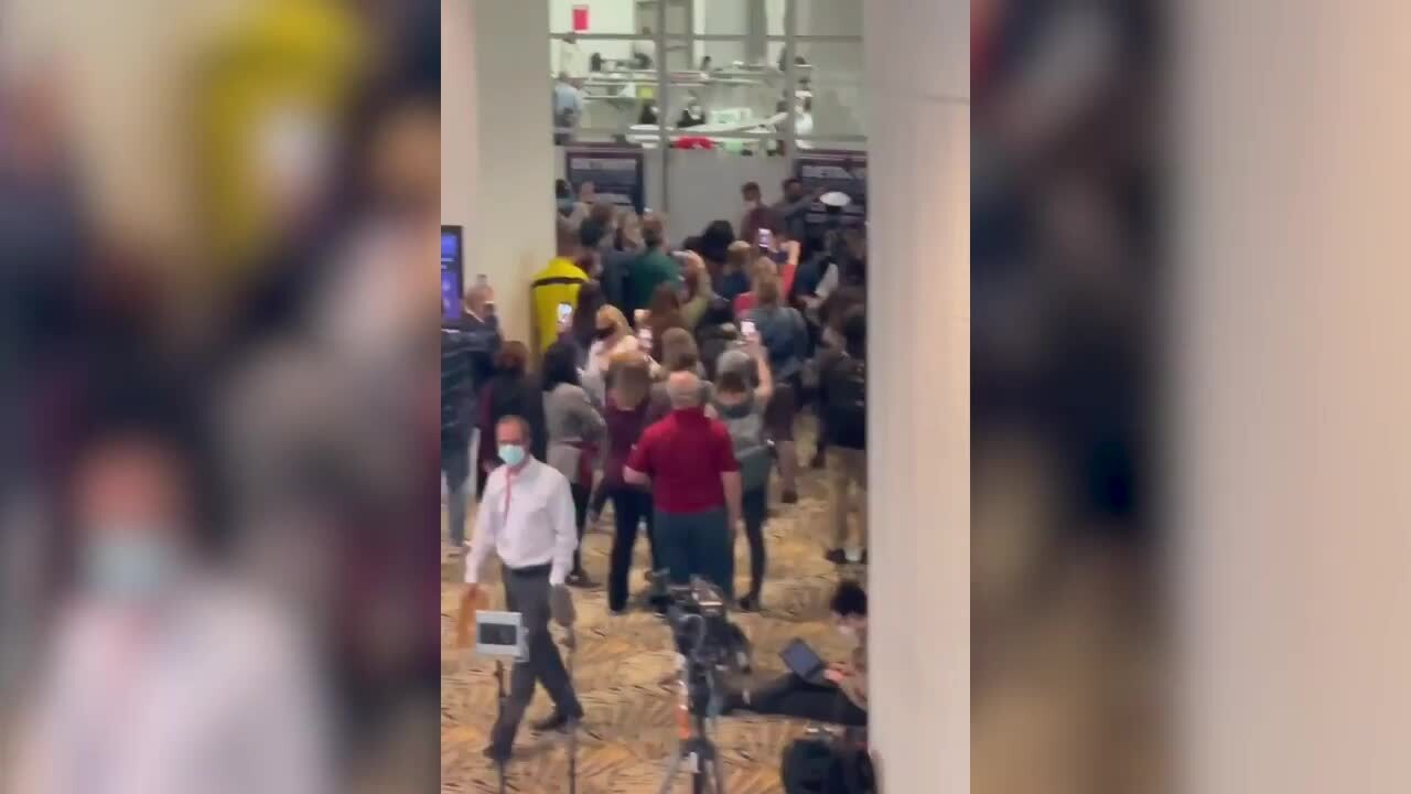 Poll watchers chant ‘Let Us In’ in Michigan vote counting center