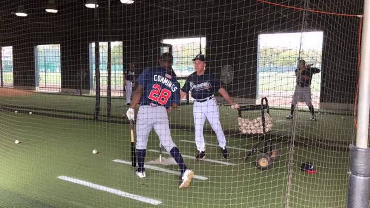 Commings practices as a member of the Braves