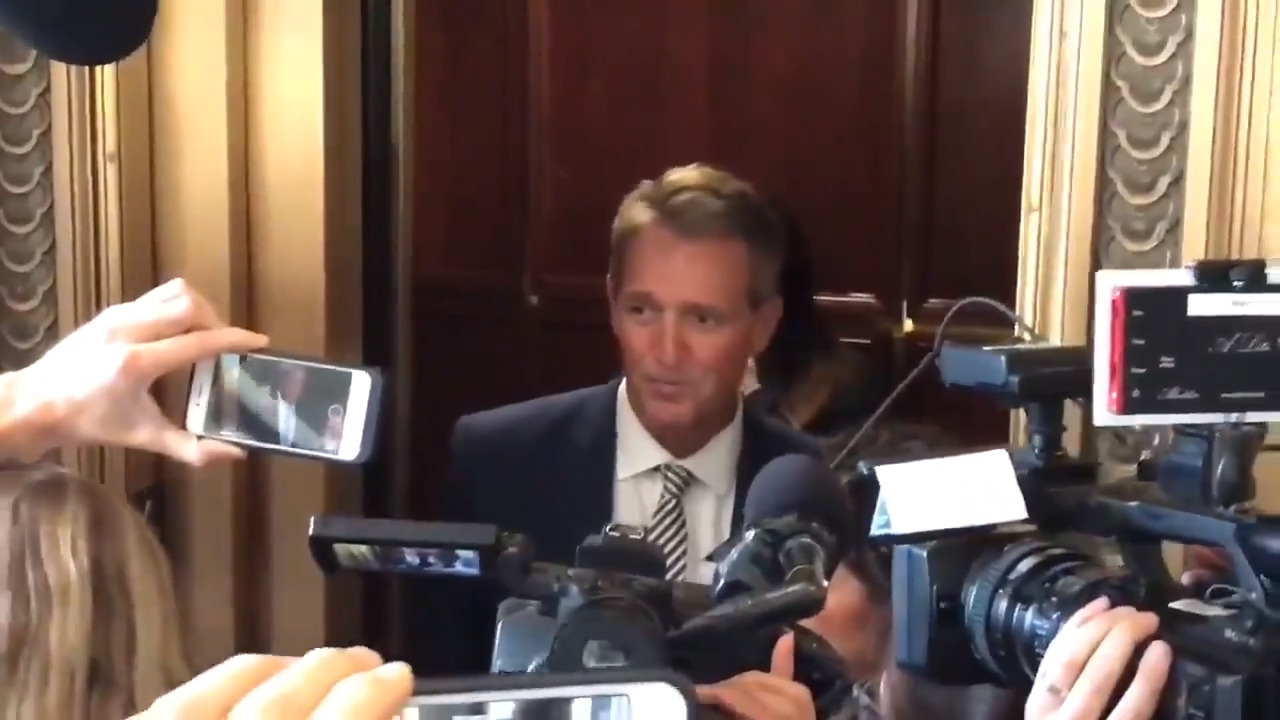Sexual assault survivors confront Sen. Jeff Flake after he says he will support Kavanaugh
