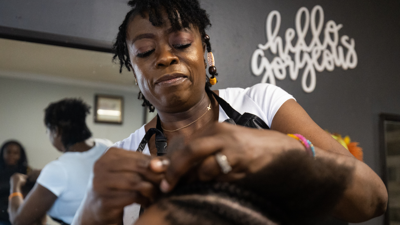 Arlington salon owner’s love for braiding started as a little girl in Africa