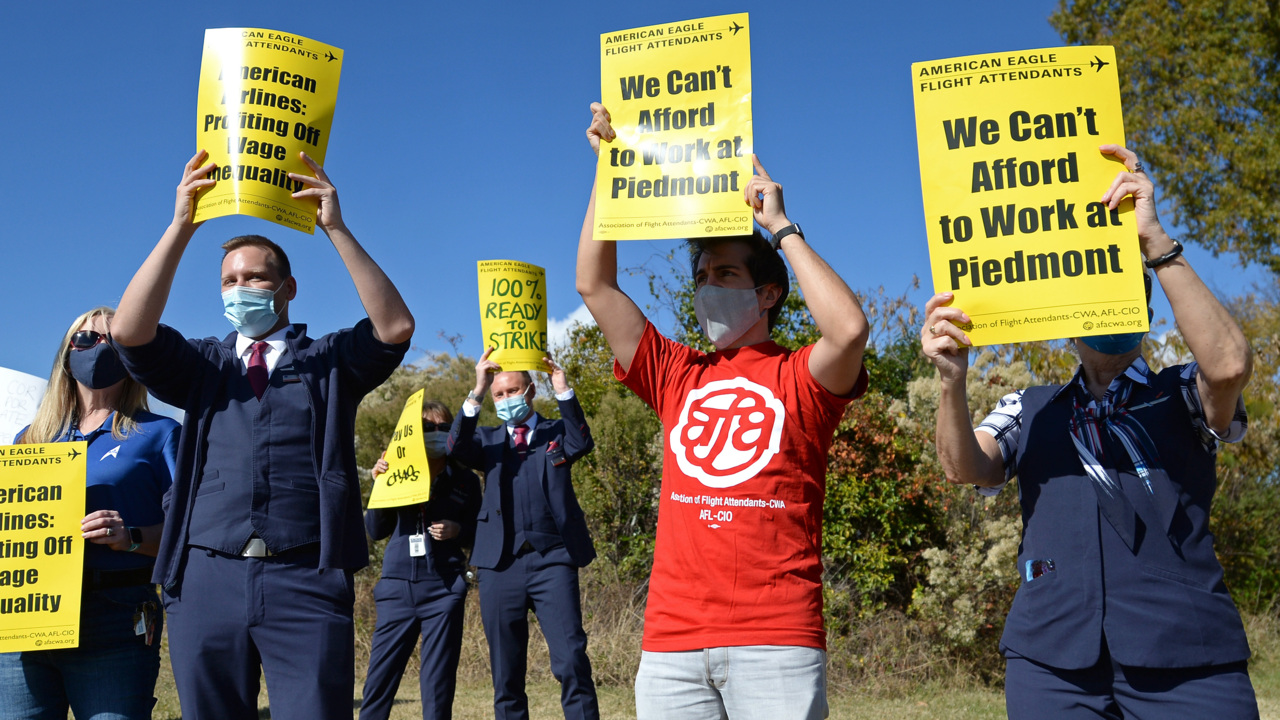 Piedmont flight attendants demonstrate outside Charlotte Douglas International Airport