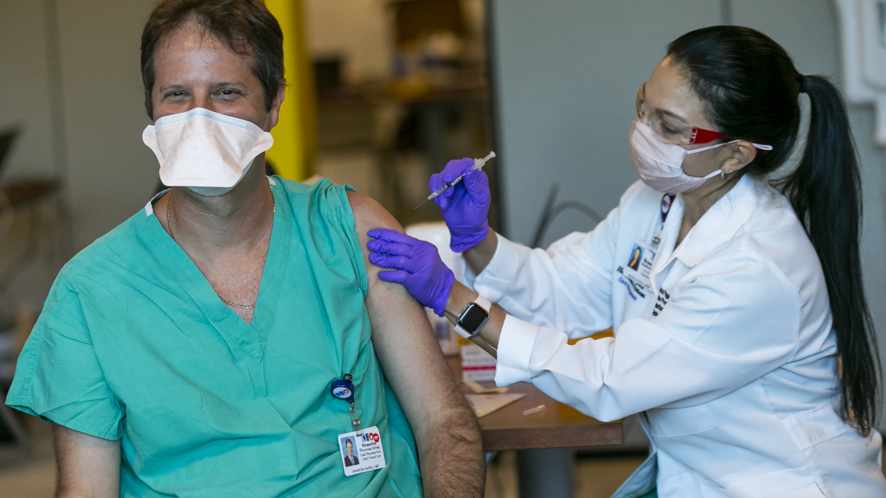 Incentives boosted hospital staff vaccination rates in South Florida. Mandates did more