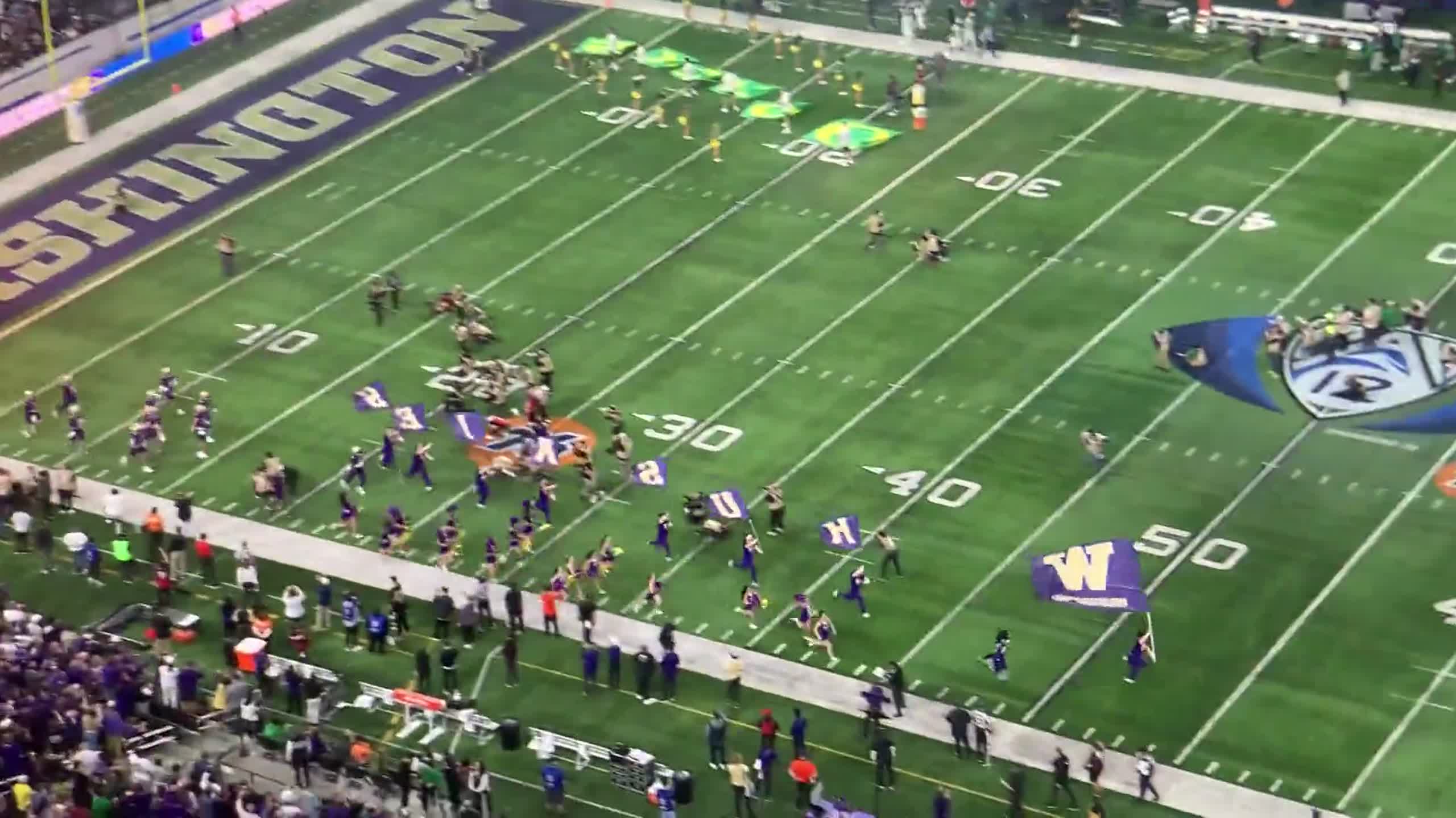 Washington Huskies come out for the Pac-12 title game vs Oregon Ducks in Las Vegas