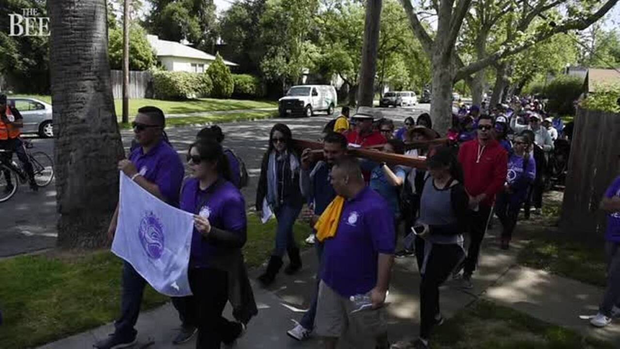 Sacramento parishoners march on Holy Saturday