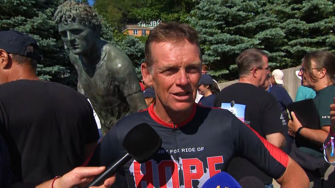 Terry Fox’s brother finishes cross-country bike ride, at same place where Marathon of Hope started