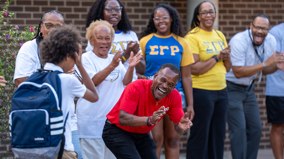 Heroes Academy volunteers 'clap in' Coleman students