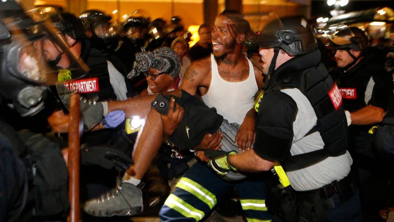 1 shot during uptown protests over police shooting