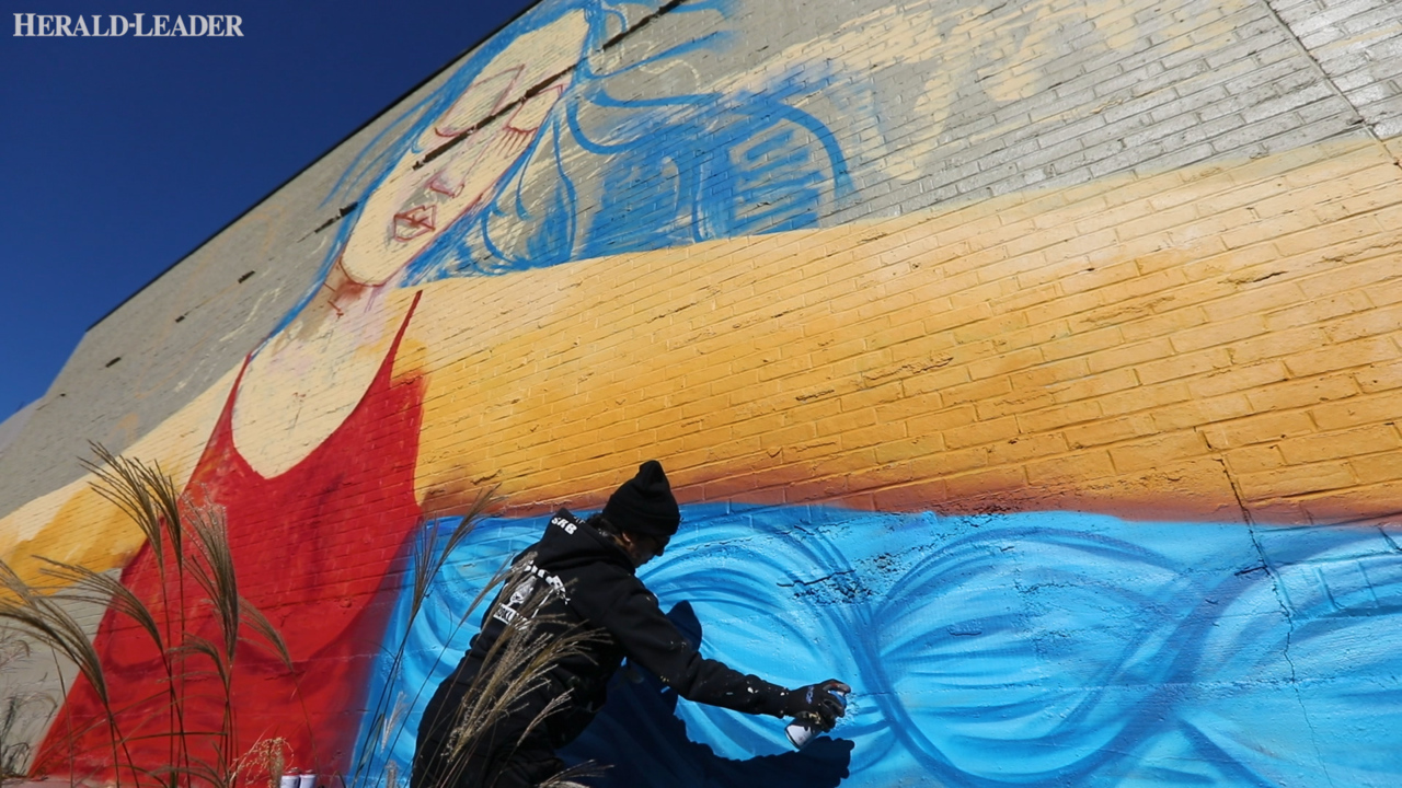 Mural honoring mothers oversees construction and traffic at Short and Midland