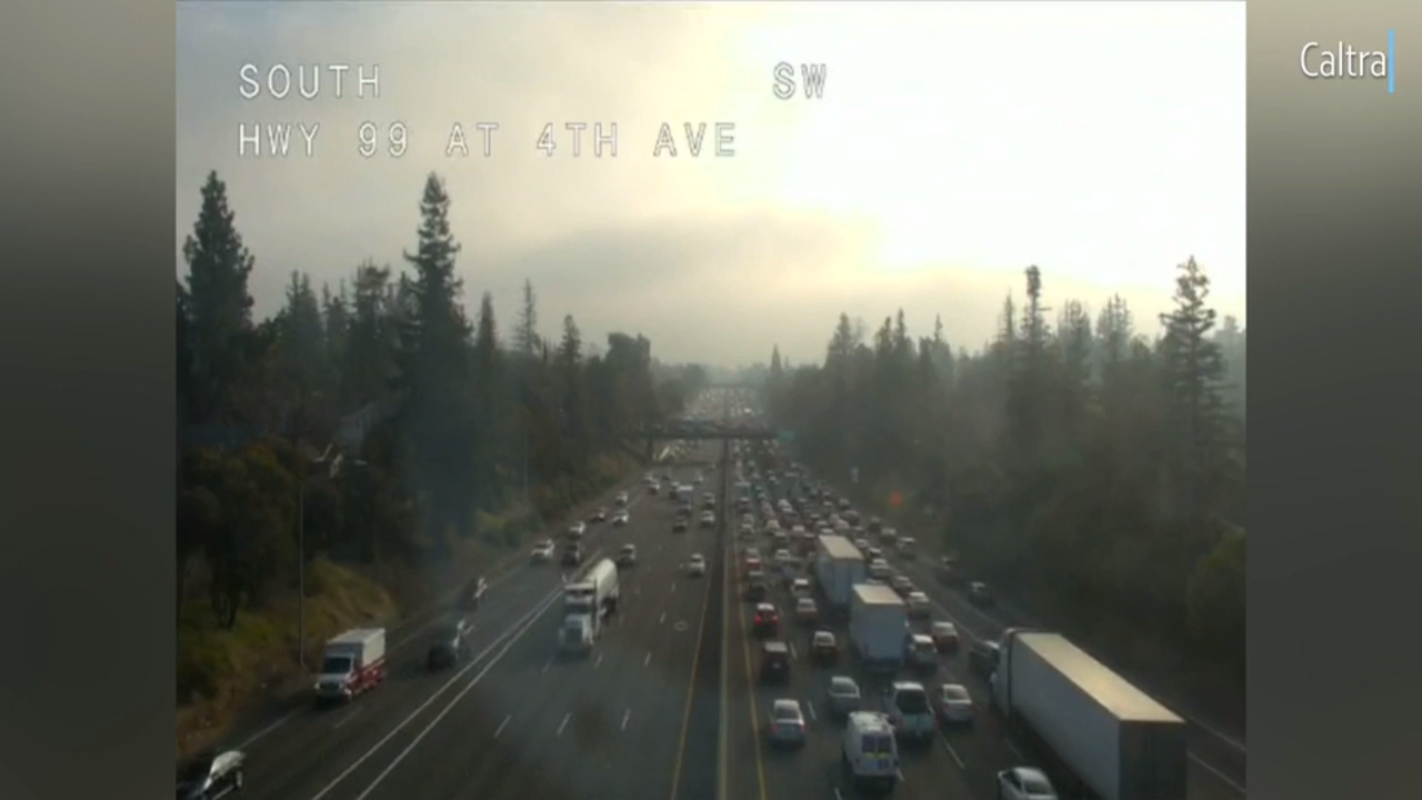 See traffic backed up on Highway 99 after overturned big rig spilled ...