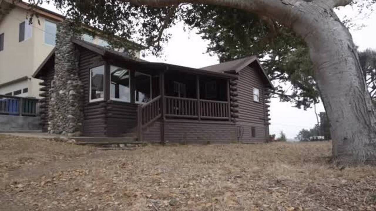 Take a peek inside this renovated Cambria log cabin