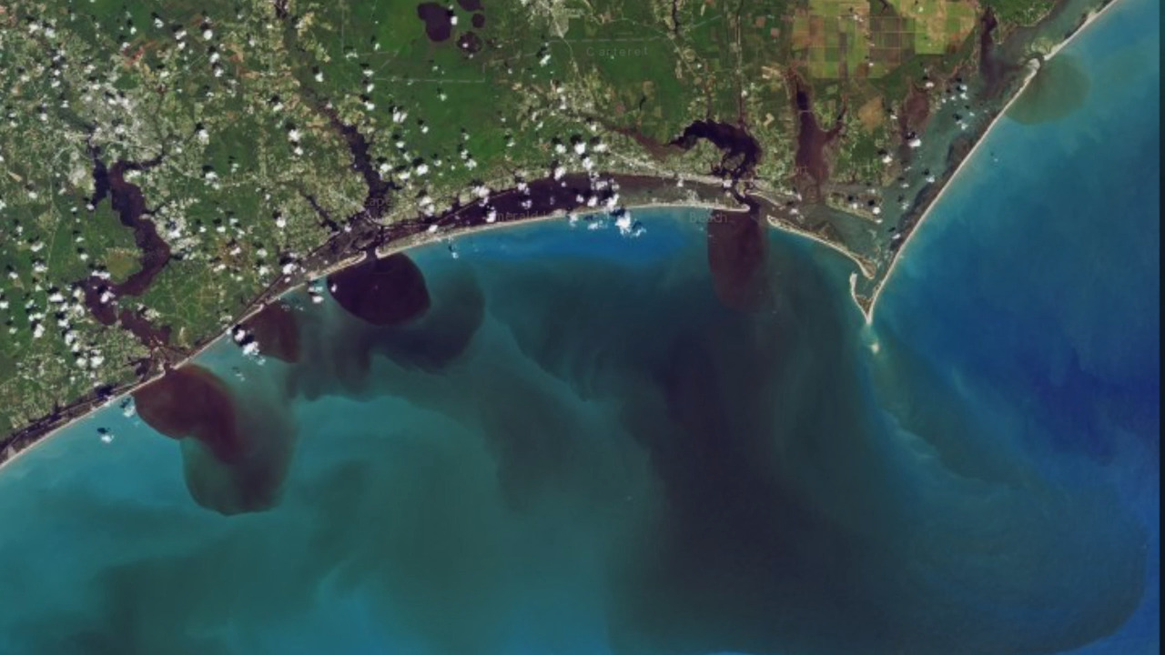 Coastal waters still filthy, but swimming ban lifted in 4 coastal counties