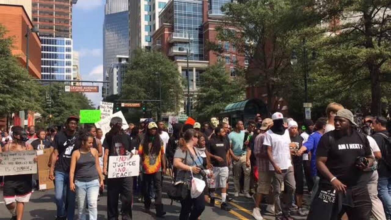 Protest moves up Tryon Street
