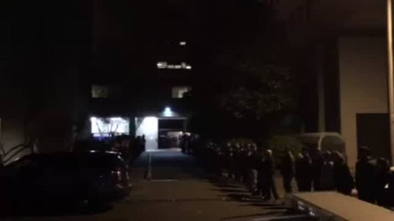 Police line street outside hospital after officer shot and killed in ...