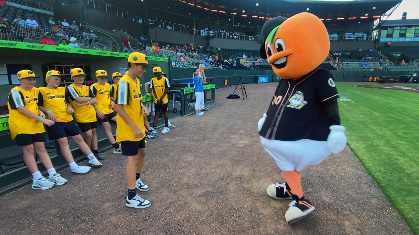 Clingstones mascot Fuzzy challenges Phenix City Little League players to dance-off. See the results here