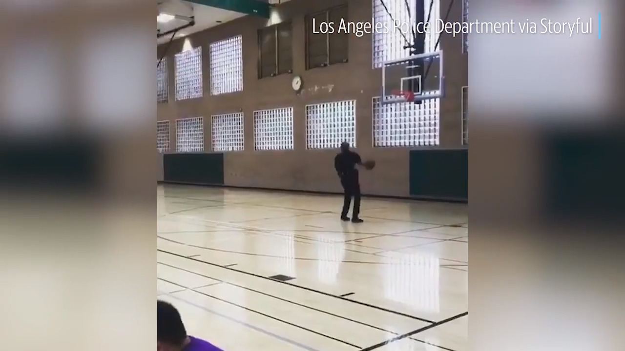 California cop drains court-length shot with back to the basket