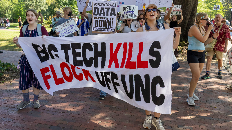 Hundreds take to the streets in Chapel Hill to oppose G20 Innovation Summit