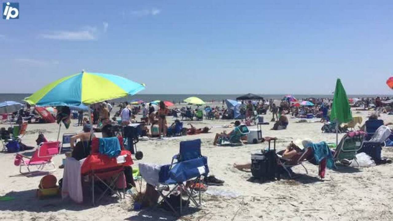 Crowded Coligny: Tourists swarm the beach over Memorial Day weekend