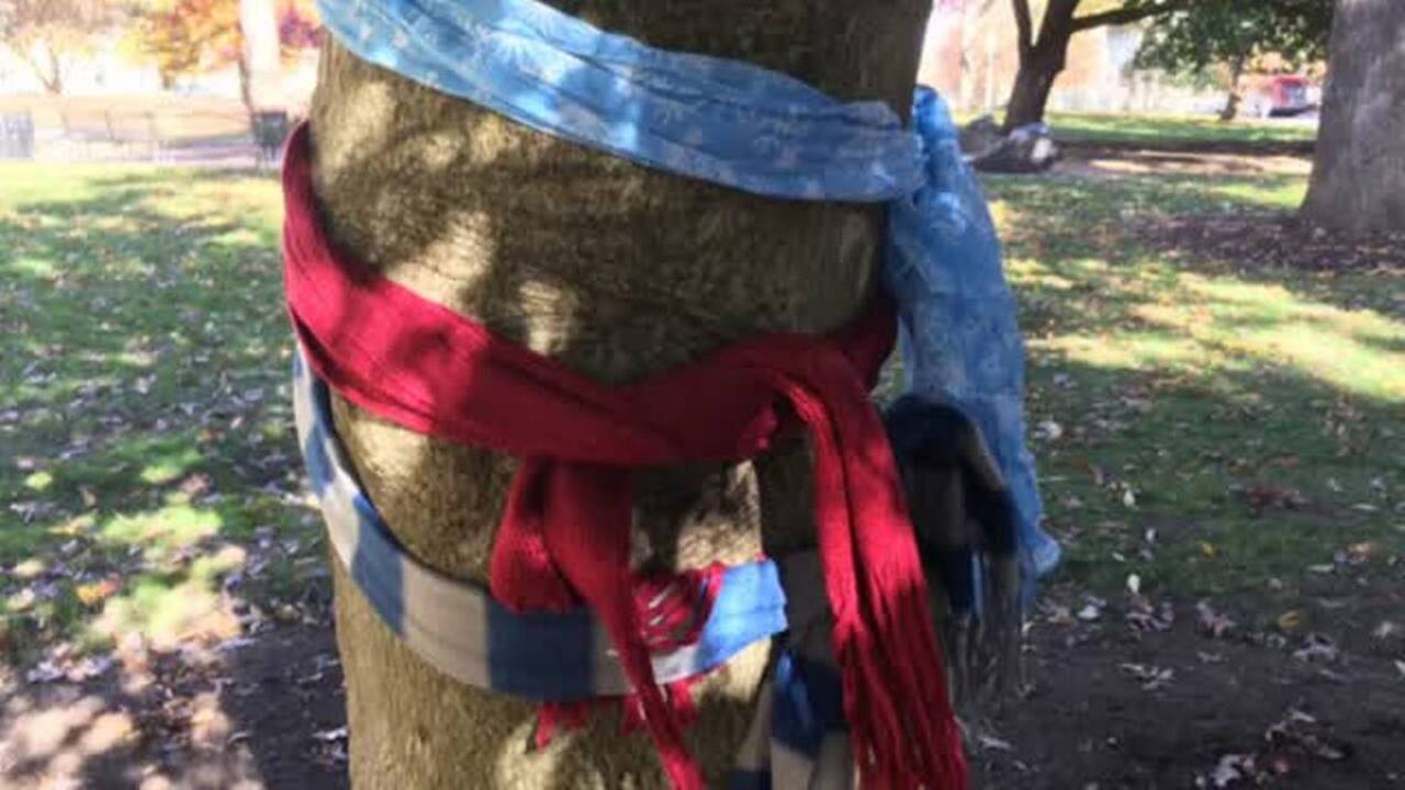 Who left clothing for the poor hanging in the trees?