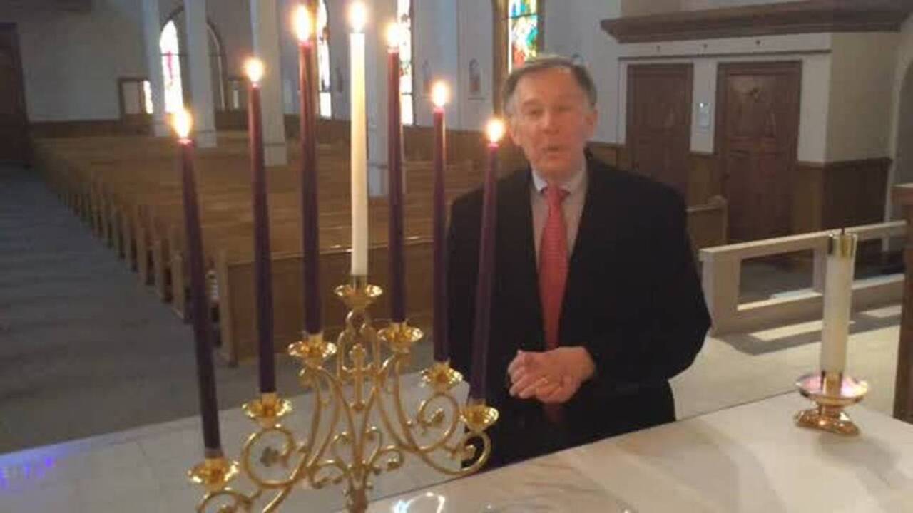 Holy Family Catholic Church holds special service in the dark