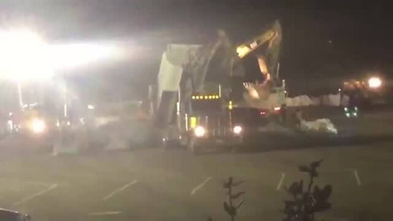 Watch the preparation before using helicopters to drop bags of rock into hole at Oroville Dam