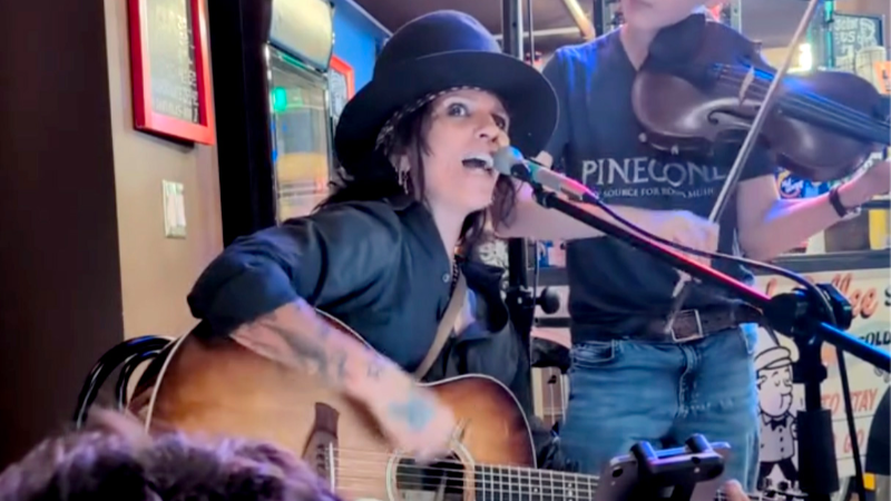 Linda Perry of 4 Non Blondes does a pop-up acoustic performance in downtown Raleigh
