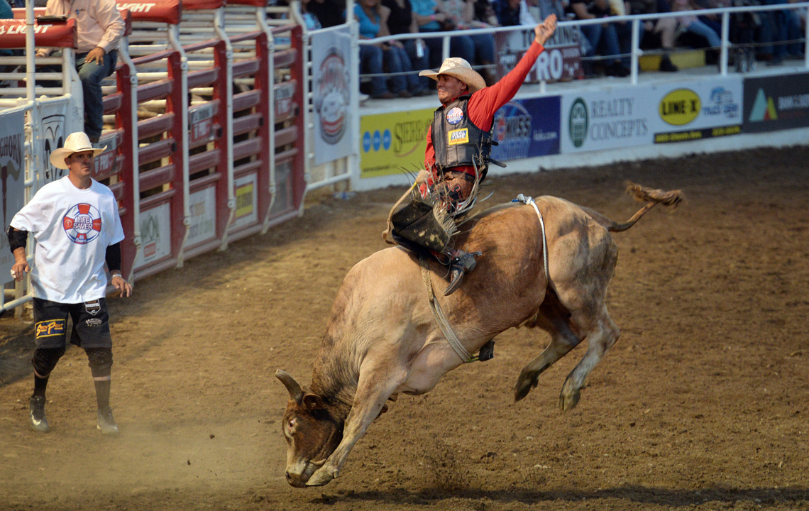 Bull riders thrill the crowd during PBR event at the Clovis Rodeo ...
