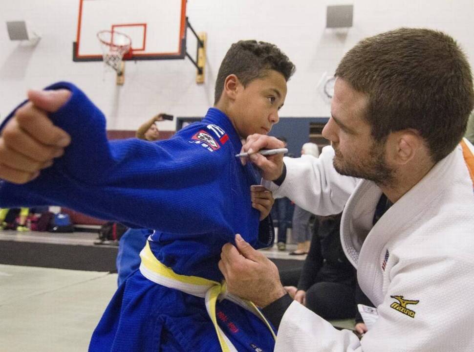 Olympic silver medalist Travis Stevens is welcomed home in Lakewood