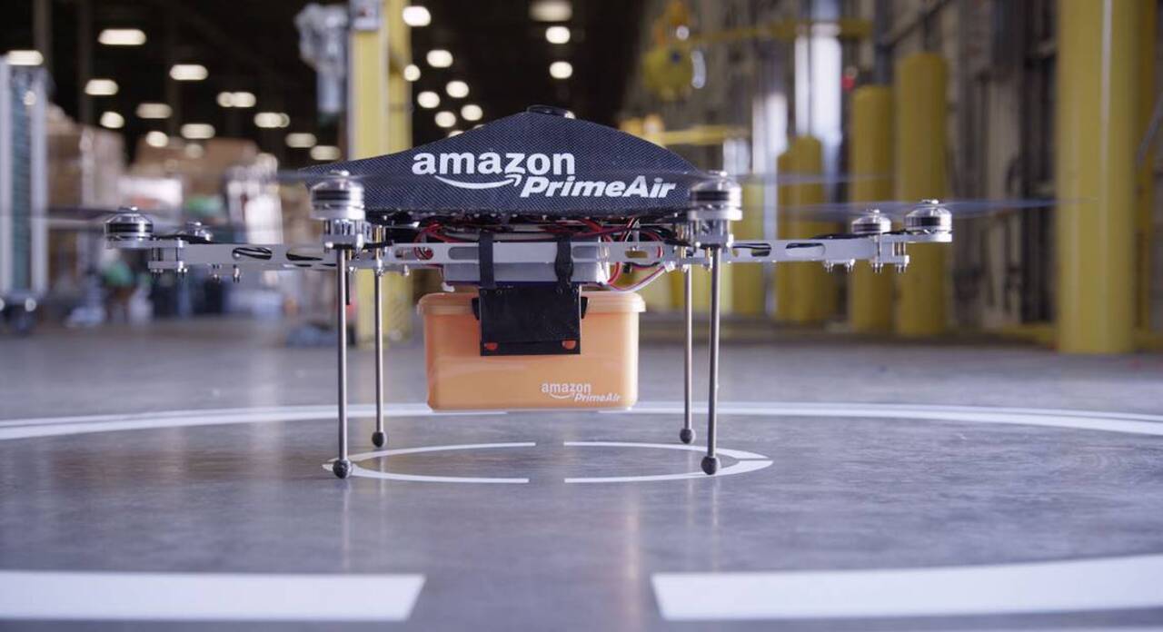 A warehouse blimp? Drones parked on lamp posts around the city? Amazon takes to skies
