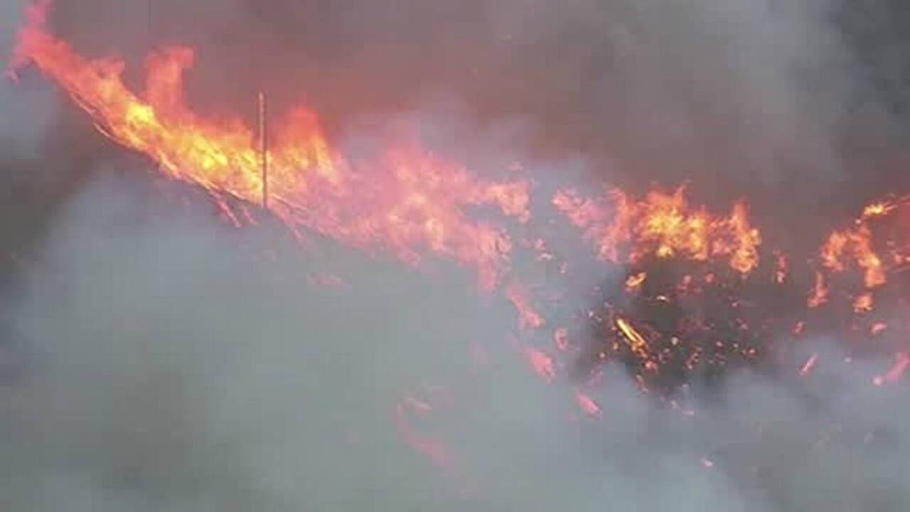 Wind-whipped blaze moves dangerously fast across Southern California