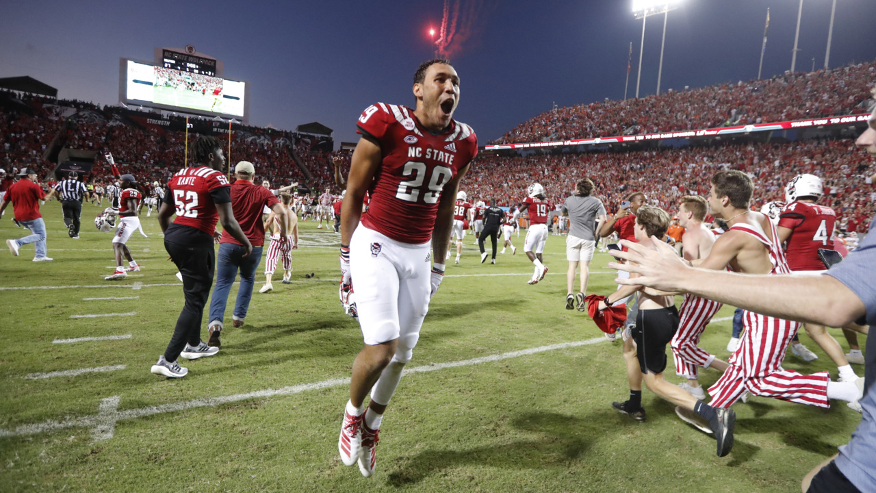 Watch: NC State football fans storm the field after the Wolfpack upset Clemson