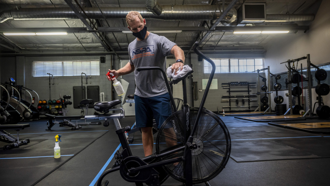 ‘I guess I’ll go back to my bricks.’ Gym members lament as fitness centers close again