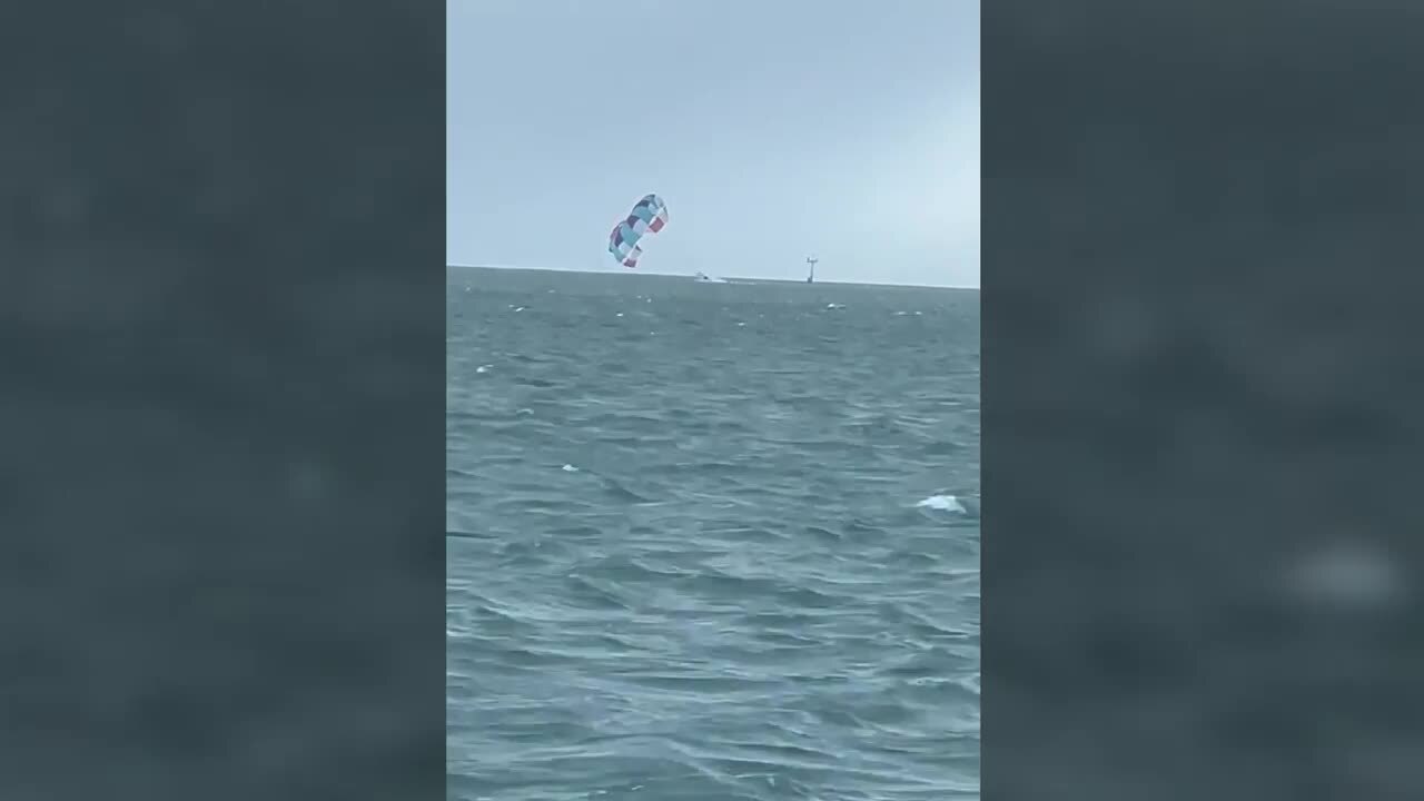 Video shows wayward parasail dragged across water before it hit a Florida Keys bridge