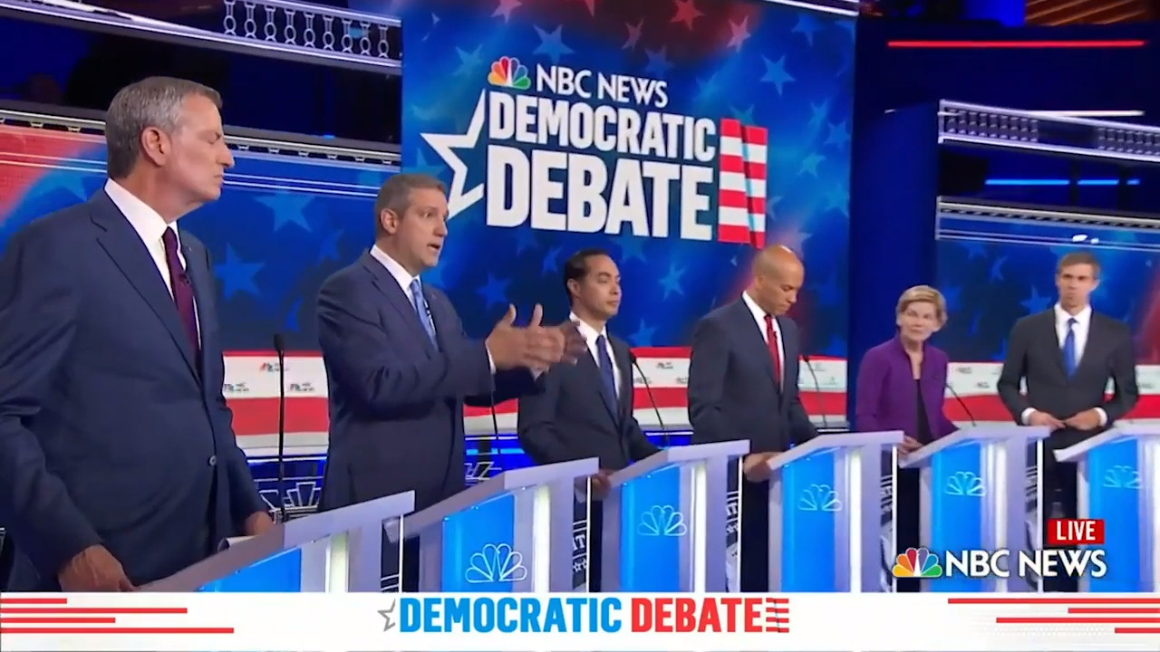 Joe Biden gets defensive during debate over his work with Mitch McConnell