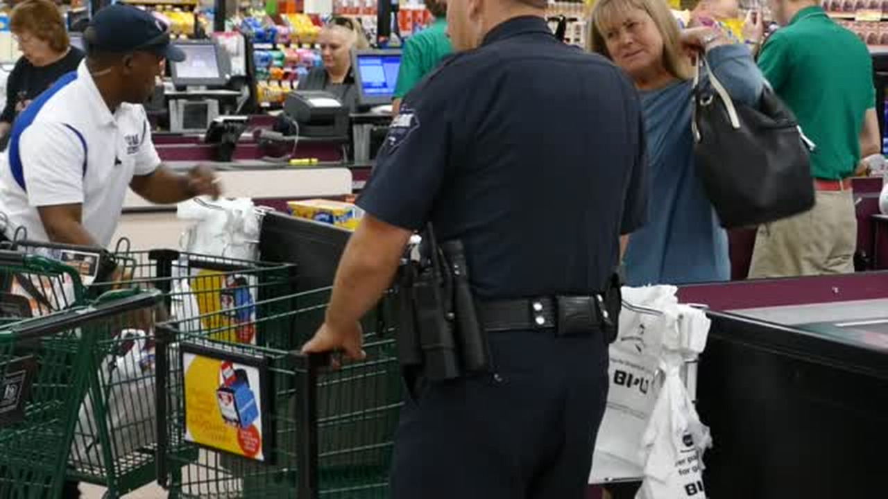 York police bag groceries to help less fortunate + video