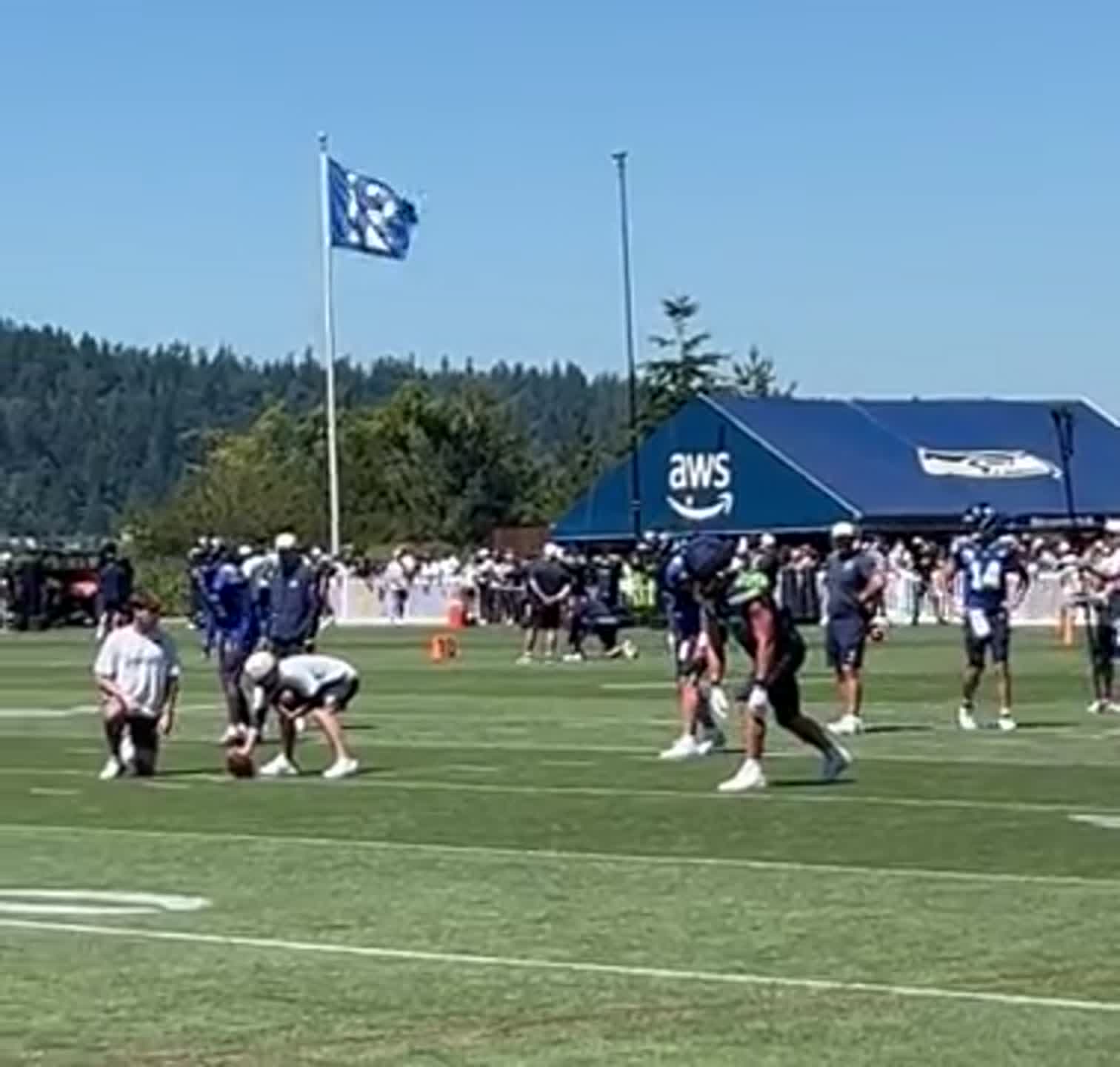 Back for 2nd Seahawks stint, Nick Vannett catches a pass from Drew Lock in training camp