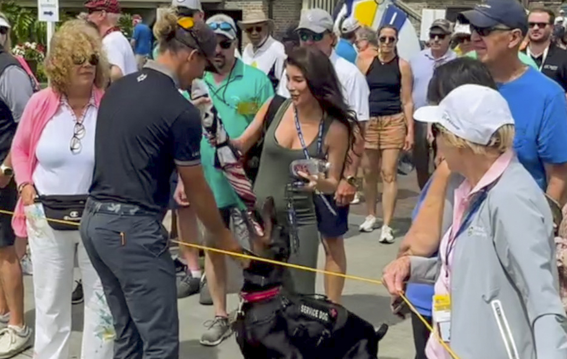 Emotional, Hoffmann’s support dog offers ‘kisses’ before golfer tees off at RBC Heritage
