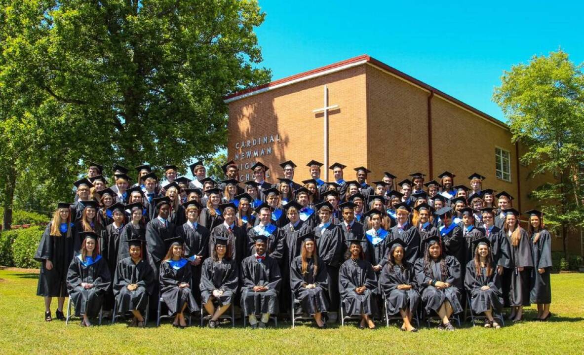 Cardinal Newman seniors give one final ‘smile’ at Forest Drive (+ video)