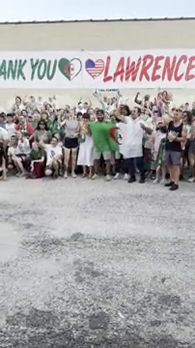Algeria fans present giant World Cup banner to Lawrence