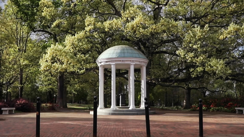 UNC makes a deal to end federal probes and keep funding.  What policies were added?
